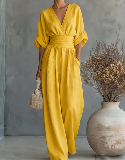 Tuta elegante con scollo a V e gamba larga