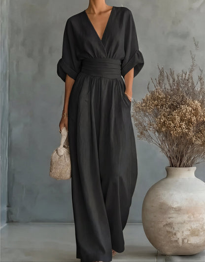 Tuta elegante con scollo a V e gamba larga
