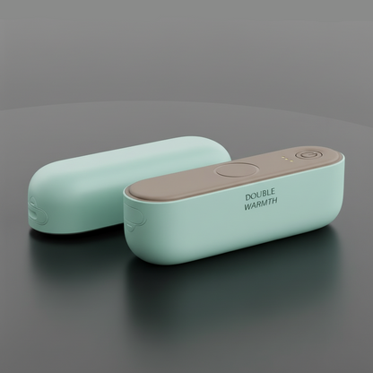 green novana hand warmers laid on a  grey surface 