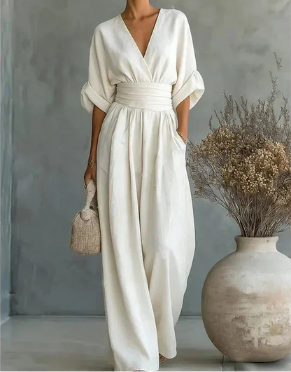 Tuta elegante con scollo a V e gamba larga