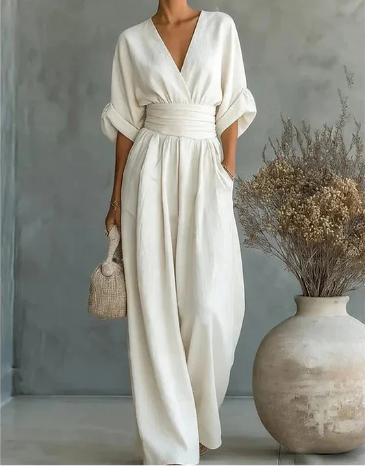 Tuta elegante con scollo a V e gamba larga