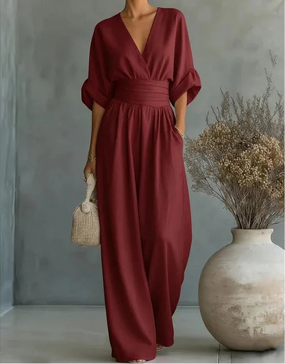 Tuta elegante con scollo a V e gamba larga